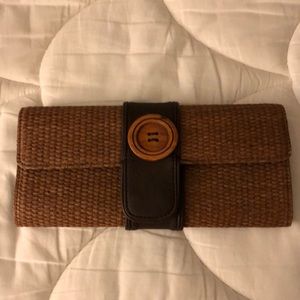 Brown straw clutch purse with button detail and chain